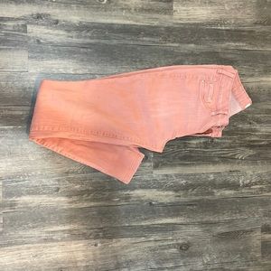 Jessica Simpson coral colored skinny jeans.